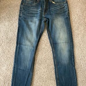 Slim fit distressed jeans